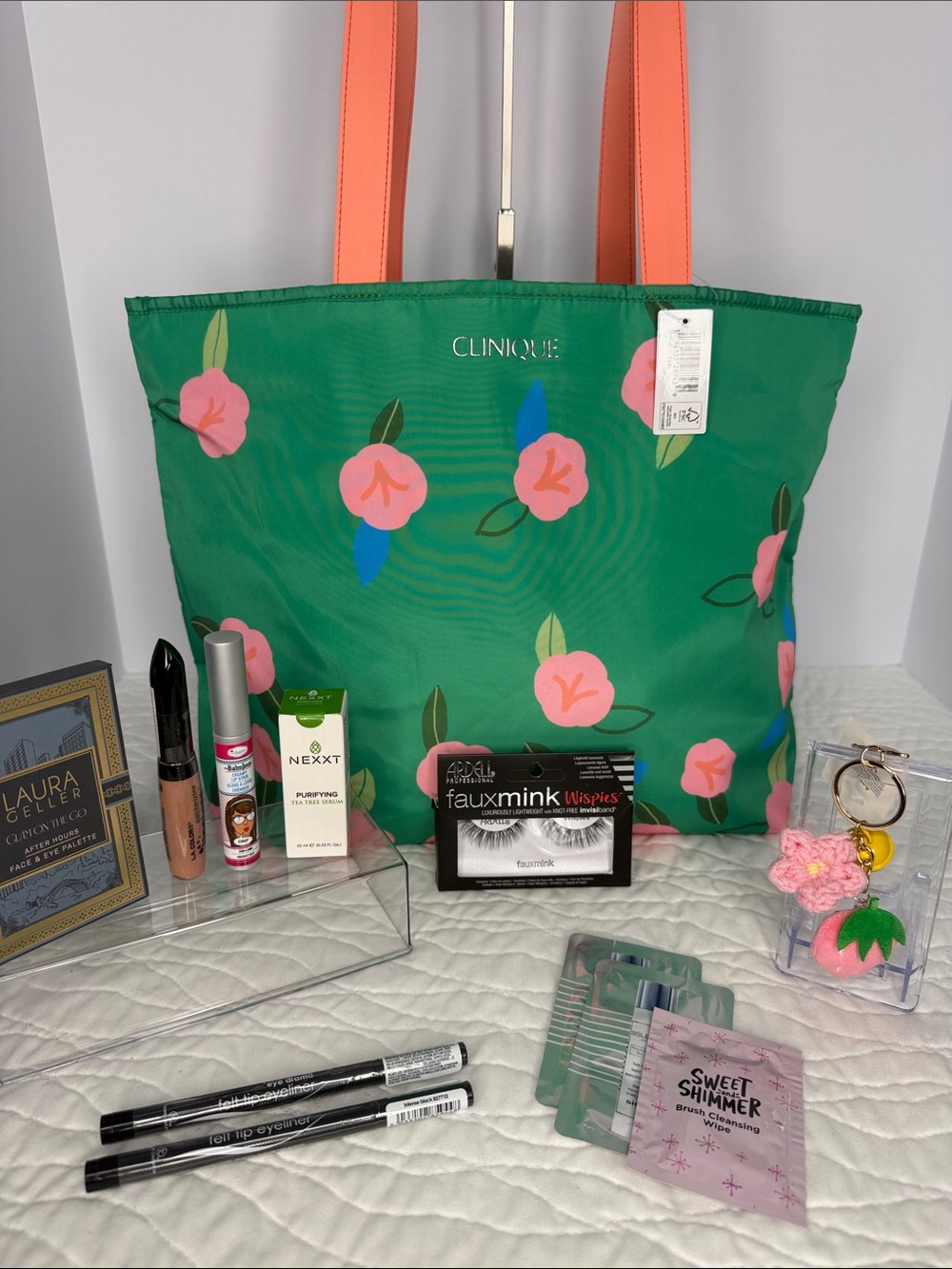 Clinique Green Floral Tote with Coral Handles Bundled with a Variety of Makeup